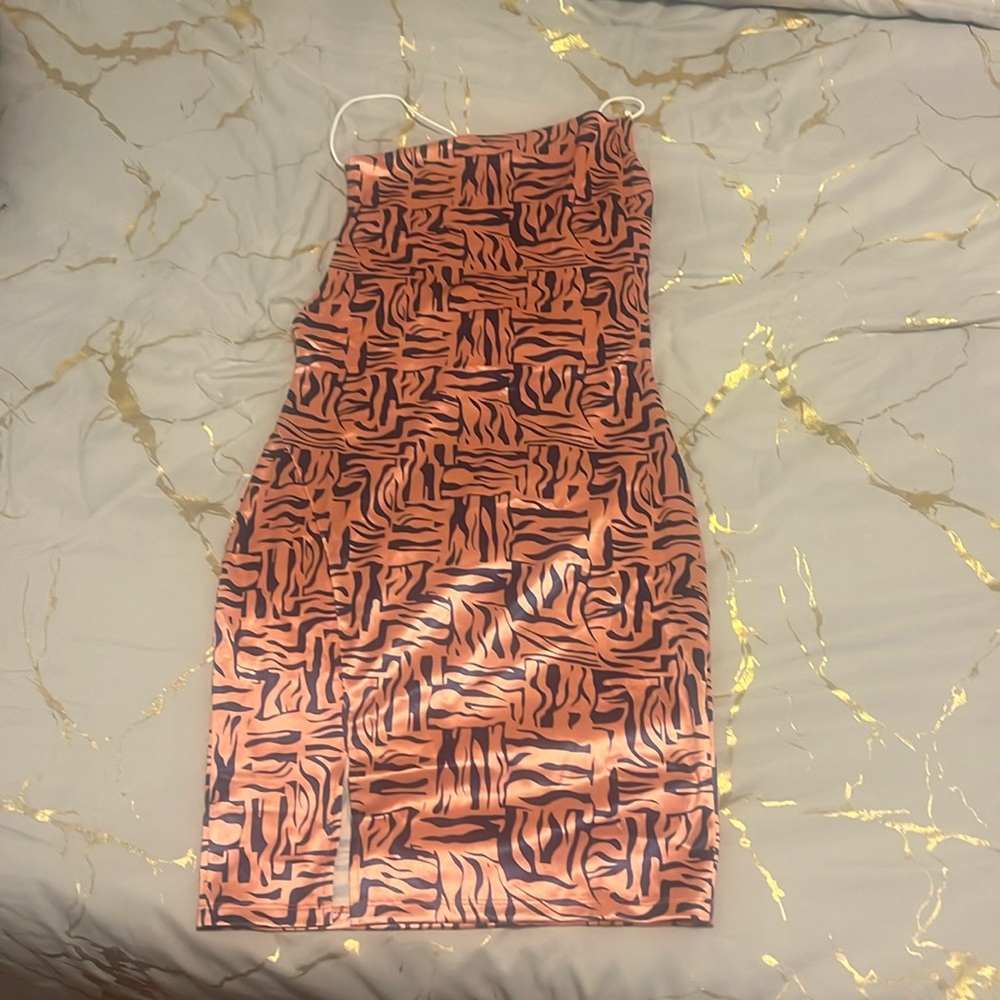 Peach and navy small dress.
